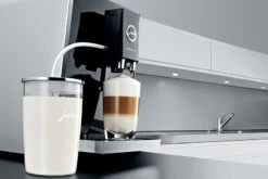 JURA Glass Milk Container -Gaggia Store 5893 original container on counter
